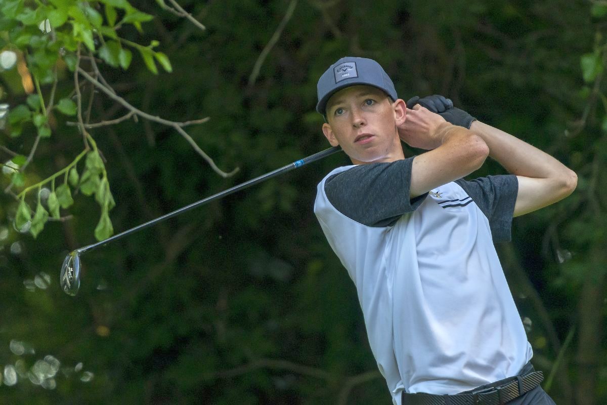 Mt. Vernon’s Sam McWilliams hits the golf ball on Wednesday during the second day of the IHSAA boys state golf tournament at Prairie View Golf Club in Carmel. (Photo by Scott Roberson) 