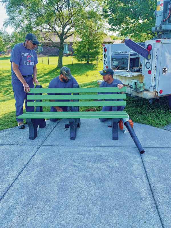 Have a seat! Bottle cap benches complete - The Daily Reporter ...