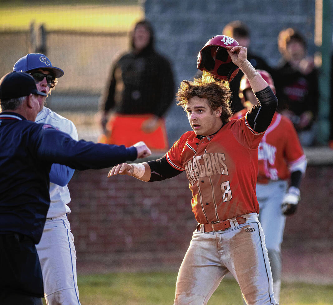 Timely hits lead New Palestine to 131 win over GreenfieldCentral