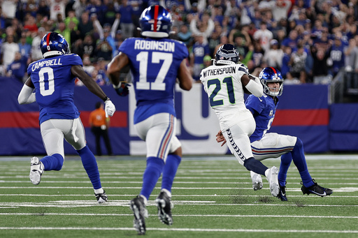 Rookie Devon Witherspoon scores on 97-yard pick six as Seahawks D leads  Seattle over Giants