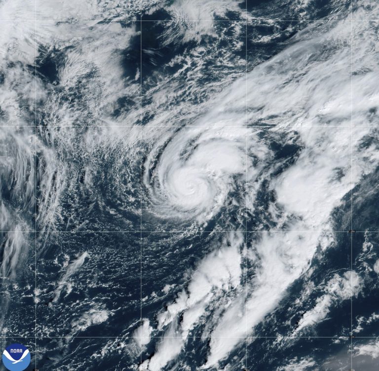 Hurricane Isaac and Tropical Storm Joyce move through the open Atlantic